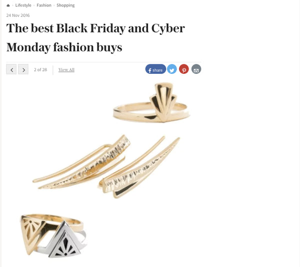 A webpage-style collage showing several gold-toned rings and earrings on a white background, with the headline 'The best Black Friday and Cyber Monday fashion buys' above the products. Features the gold Fan ring, Fan Ear pins, and a silver and gild rise ring