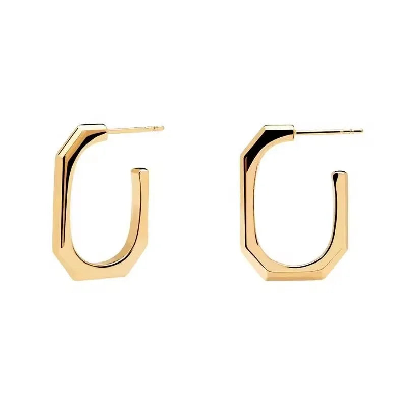 A pair of gold geometric Square hoop earrings with a modern stepped octagonal design, shown on a plain white background.