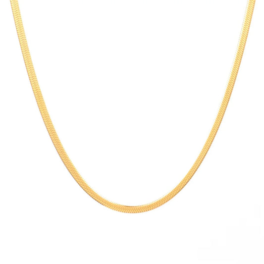 A close-up of a gold-toned herringbone chain necklace on a plain white background.