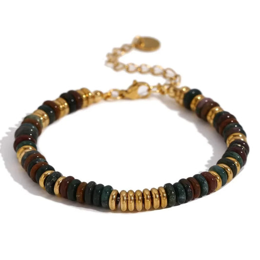 A beaded bracelet with alternating dark green, brown, and black gemstone beads and polished gold spacer beads, finished with a gold clasp and extender chain on a white background.