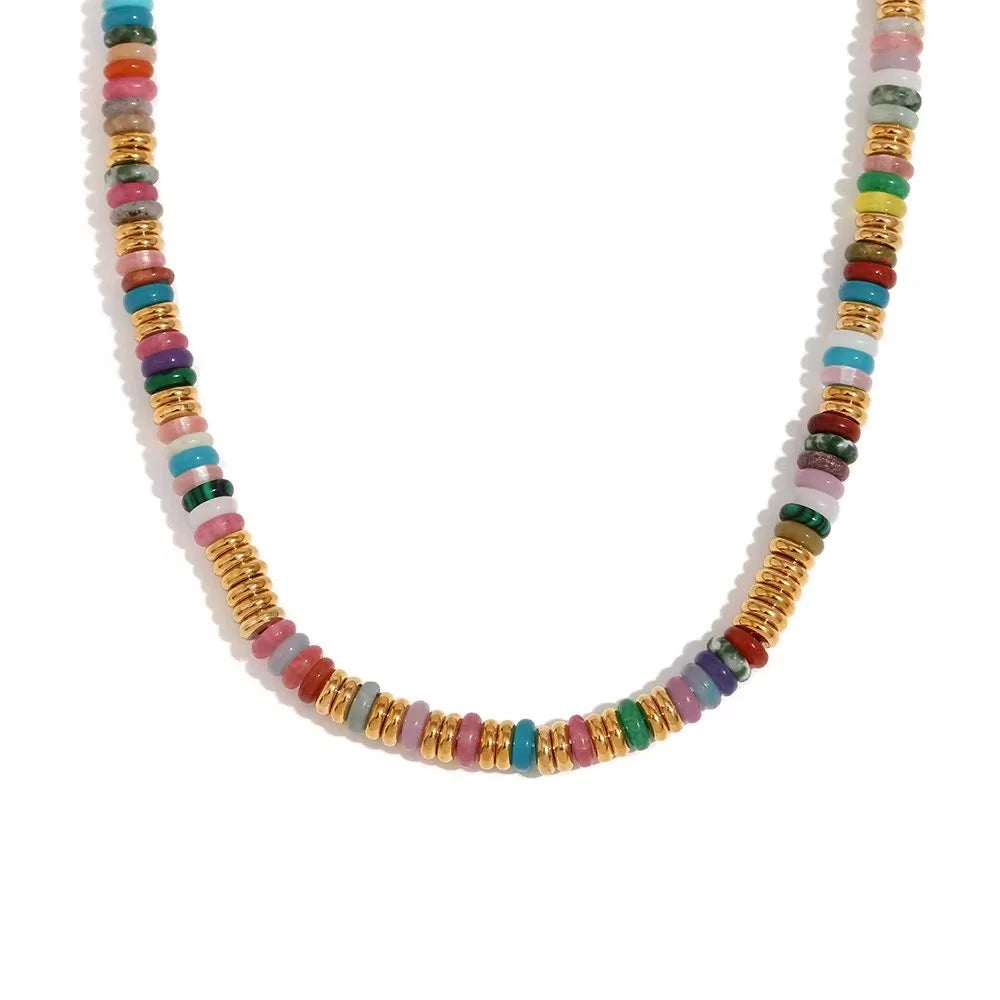 Multicolored beaded necklace on a white background