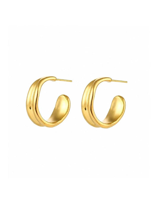 A pair of gold-toned, Molten hoop earrings with a polished finish and post backs, displayed against a solid white background.