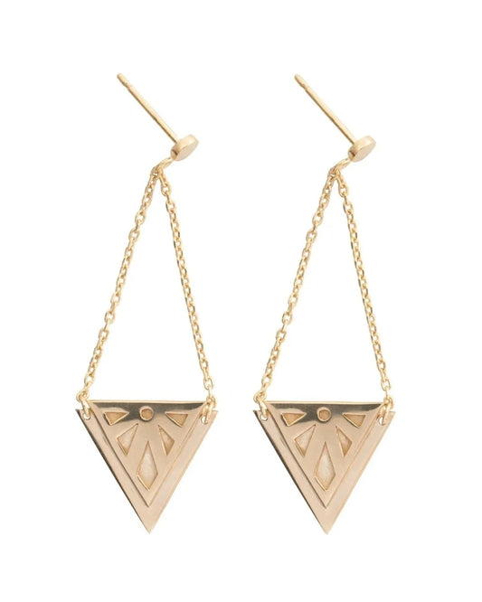 A pair of gold drop earrings featuring a triangular pendant with an engraved art deco sunrise  pattern, suspended from a delicate chain on a solid white background.