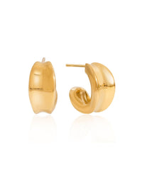A pair of polished gold small but chunky hoop earrings shown from the side and back on a clean white background with a soft reflection below. 