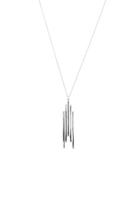 Geometric gradated design of the silver Stack necklace on a long silver chain on white background