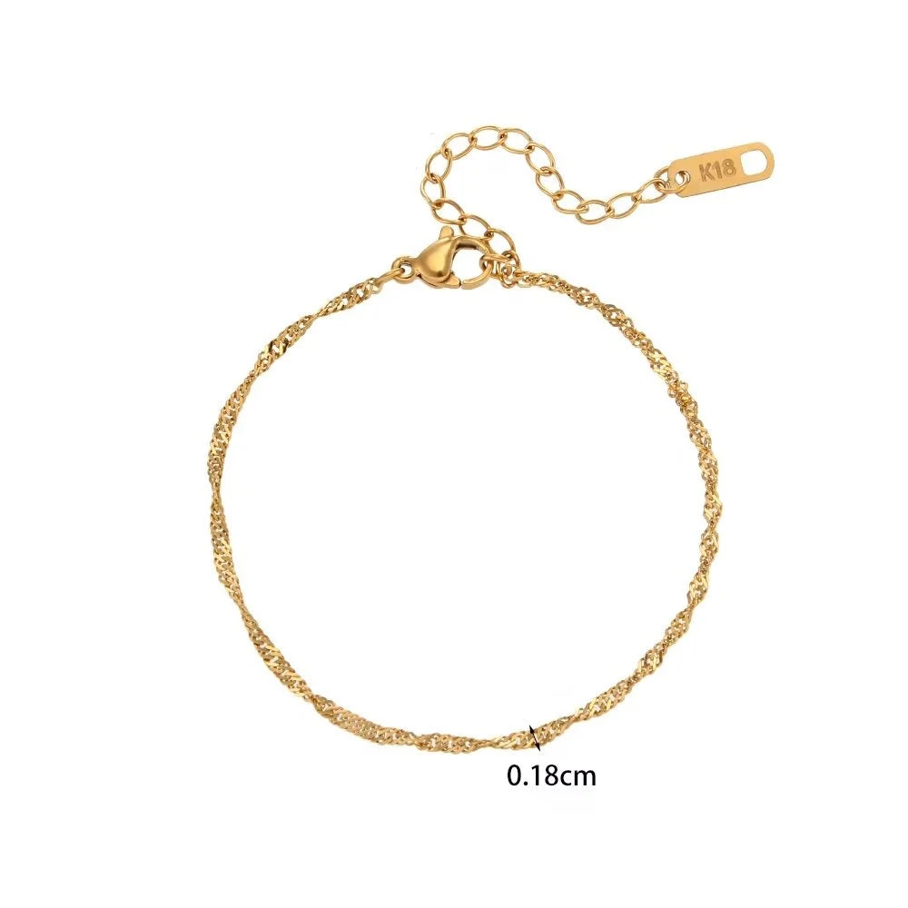 A gold-colored twisted rope chain bracelet with a lobster clasp and an adjustable extender, shown on a plain white background with a size label of 0.18cm.