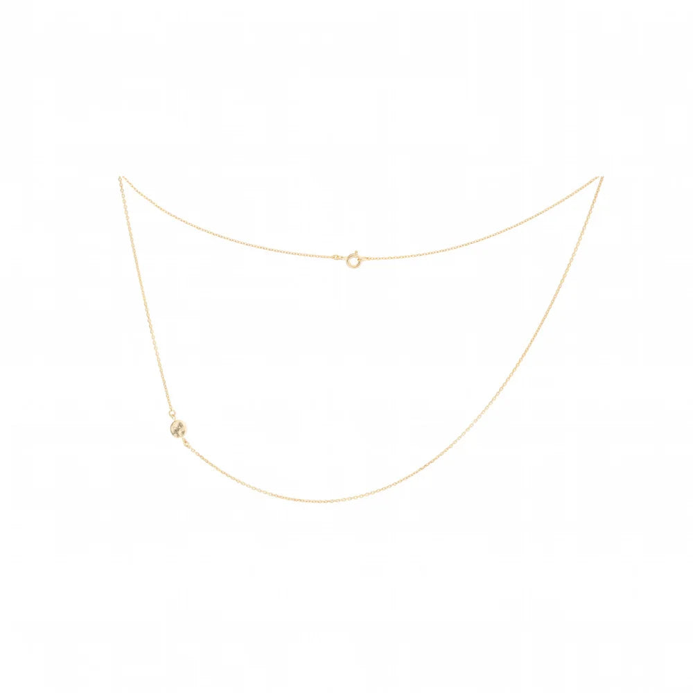 A delicate gold chain necklace with a small circular bead detail and a tiny ring clasp, displayed on a clean white background. This is the view of a single strand if worn at the back 