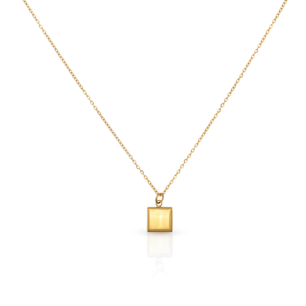 Gold necklace with a square pendant on a white background